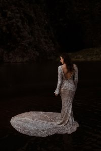 A silver long sleeved sequin Custom Bridal Wedding Dress